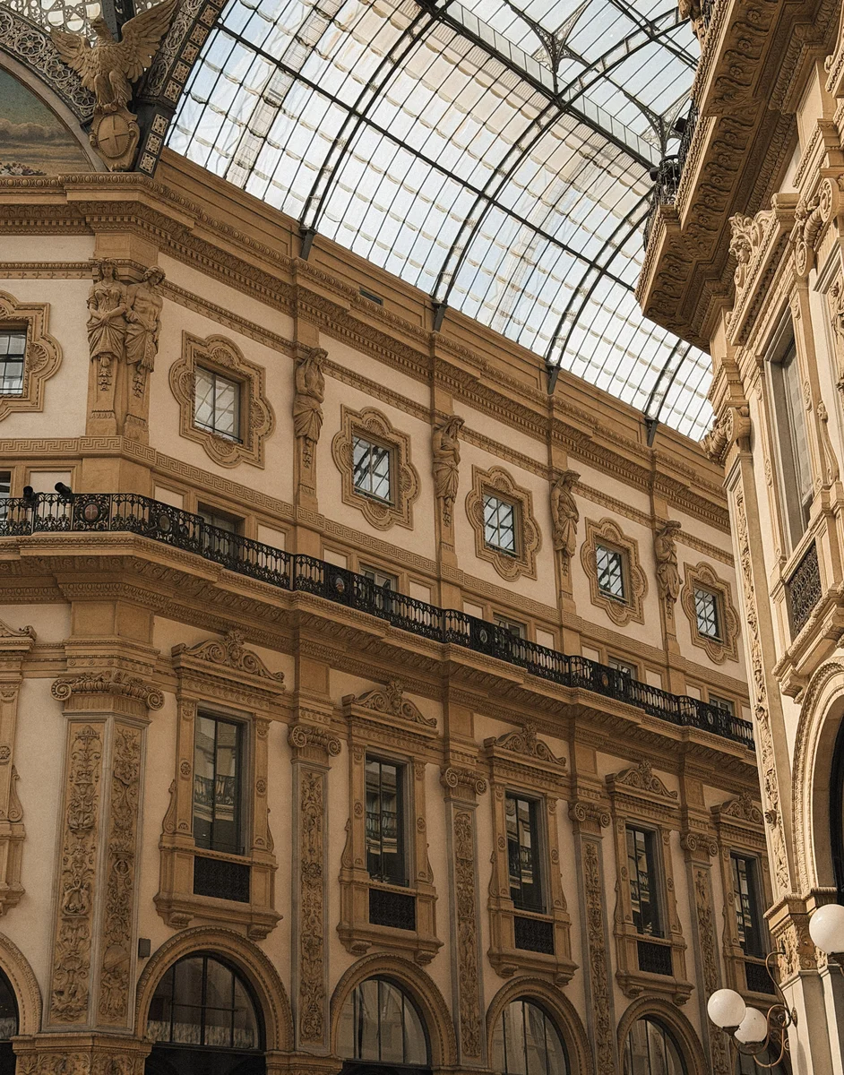 Historic glass-and-iron shopping arcade in an old New York street