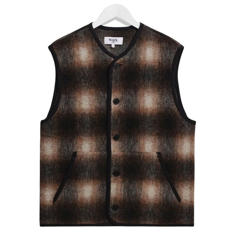 Earthy plaid wool gilet with black trim and buttons