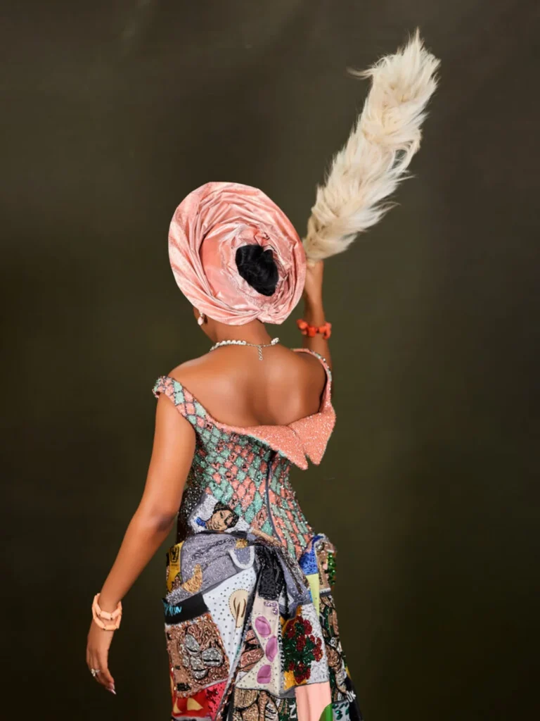 Kiky Faminu in a peach gele and patchwork wedding gown