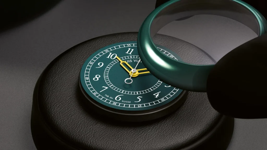 Green ceramic Louis Vuitton Monterey watch displayed on a black stand